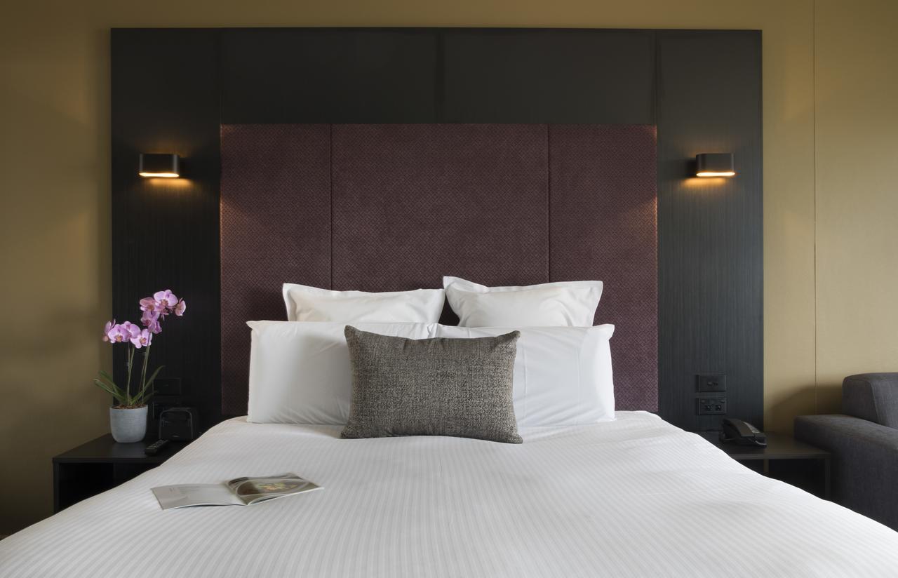 Pullman Sydney Hyde Park Hotel Luaran gambar A bedroom at the hotel